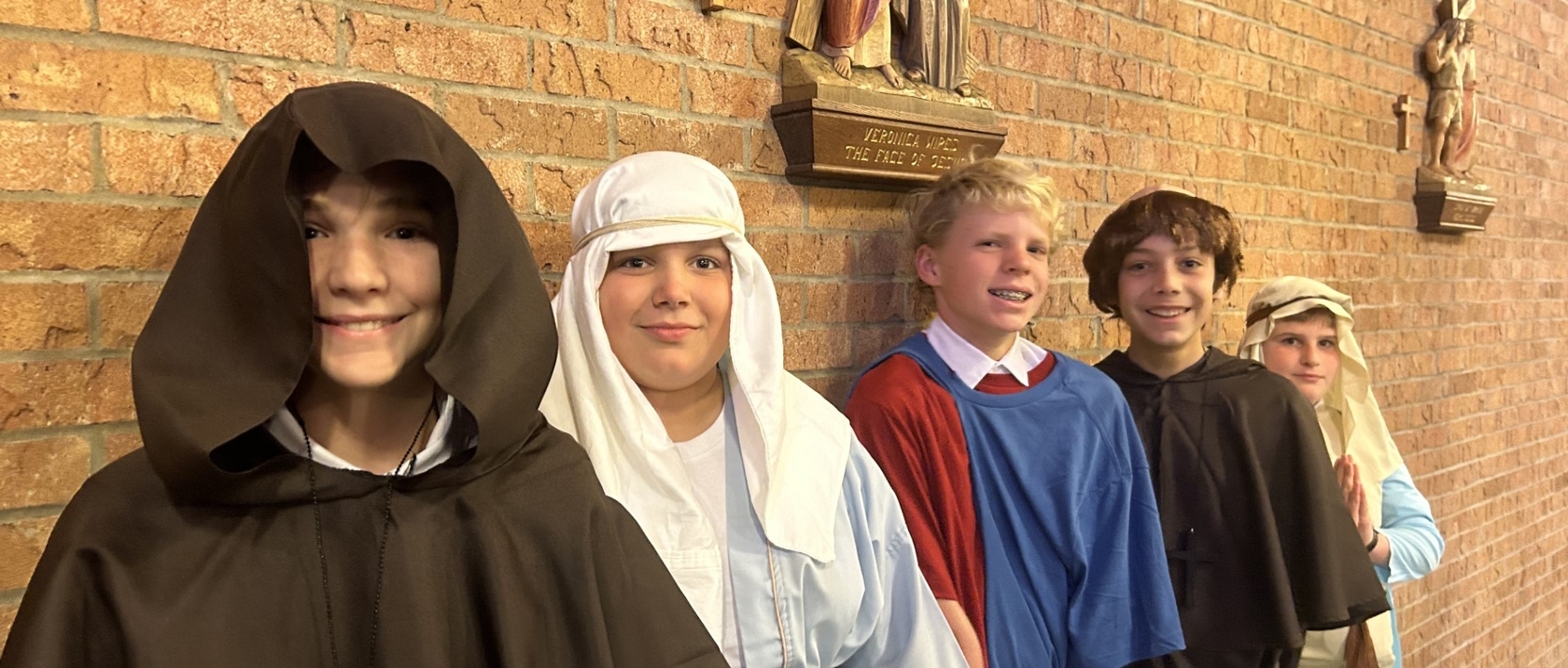 children dressed as saints