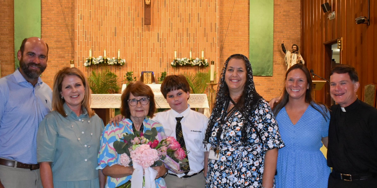 Ms. Smith being honored with Teacher Of The Year